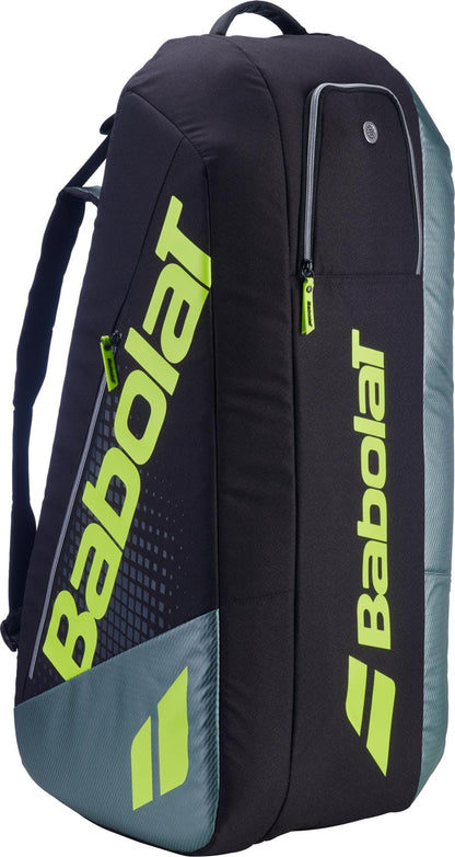 The Babolat RH6 Pure Aero 6 Racket Tennis Bag in grey and yellow offers side pockets and shoulder straps, making it an ideal choice for carrying your rackets and gear with ease.