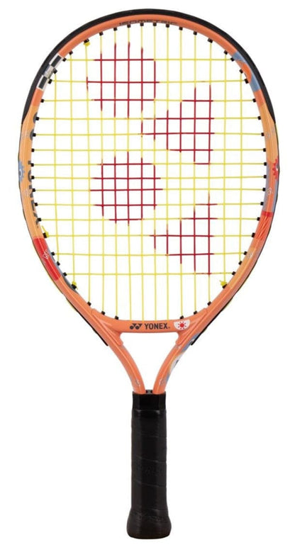 The Yonex Junior 17 Coral Orange Tennis Racket features a vibrant coral orange frame, yellow strings with a red Yonex logo, and a black grip—ideal as a beginner racket for young players.