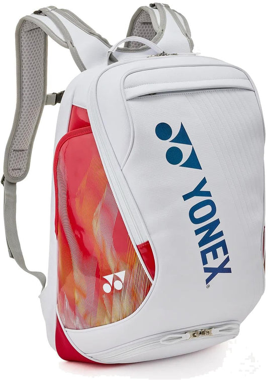 The Yonex 02612EX Expert Tennis Backpack in white by Yonex features padded shoulder straps, a zippered front compartment, and a stylish design—ideal for tennis players on the go.