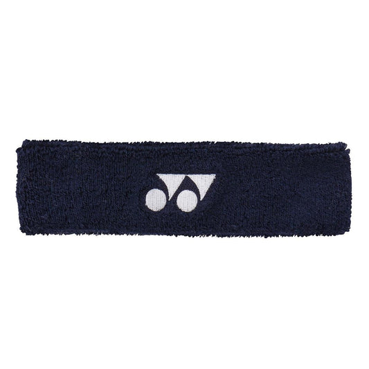 The Yonex AC259 Headband in navy blue showcases a white logo with twin circles and a stylized "Y" at the center. Crafted from sweat-absorbing, anti-bacterial materials, it ensures you stay cool and comfortable during intense workouts.