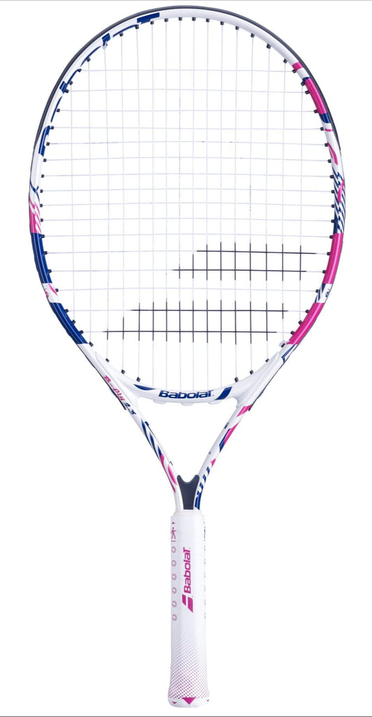 The Babolat B-Fly 23 Junior Tennis Racket showcases a blue and pink pattern on its white frame and strings, with the brand name "Babolat" prominently displayed on both the shaft and head. The racket features a white grip highlighted with pink accents, designed for beginners, and is set against a plain white background.