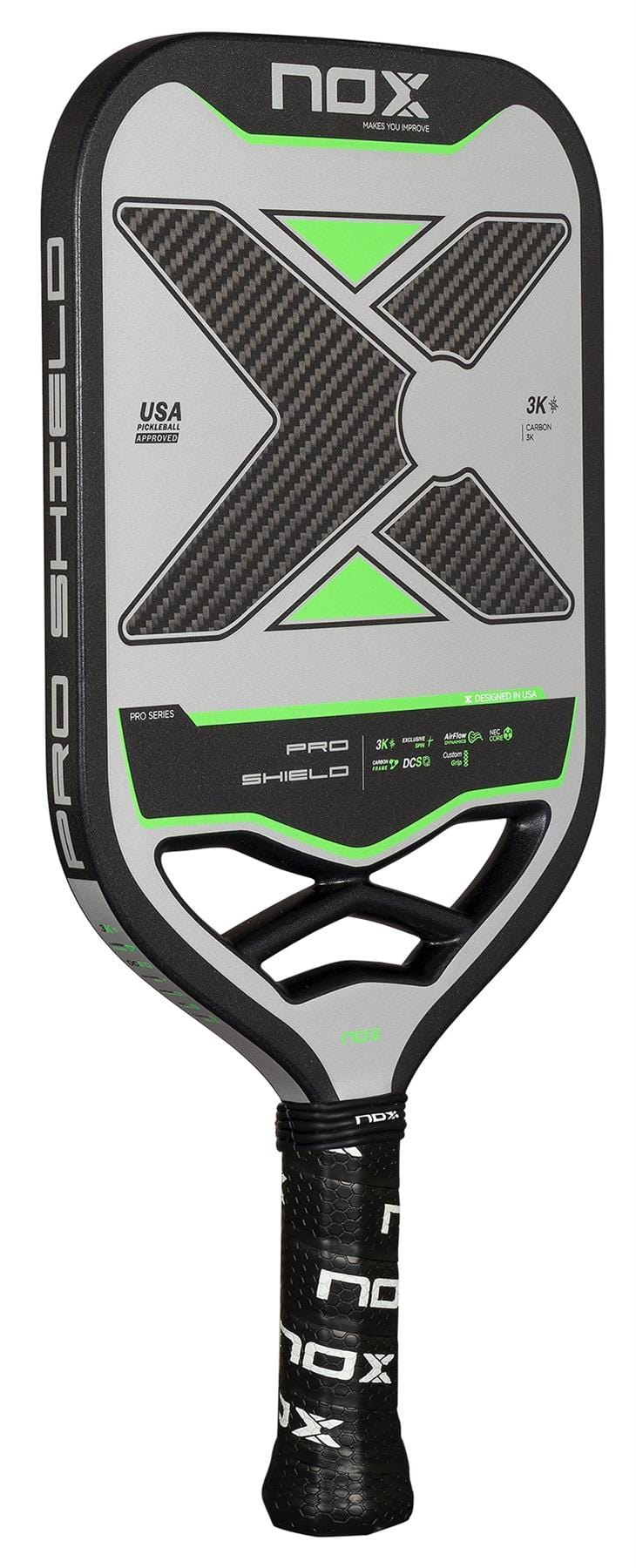 The NOX Pro Shield Pickleball Paddle features a black, grey, and neon green carbon fiber design with textured surface, advanced spin technology, USA Pickleball approval, and a handle wrapped in black grip tape with white NOX branding.