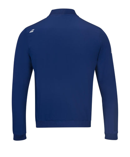 Here's a rewritten version of the sentence using the provided product data:

The back view of the Babolat Play Men's Tennis Jacket in estate blue showcases a clean design with long sleeves. It features a discreet white logo on the upper back and ends at the waist, making it ideal for chilly winter evenings. Made from four-way stretch fabric, this jacket offers superior comfort and mobility.