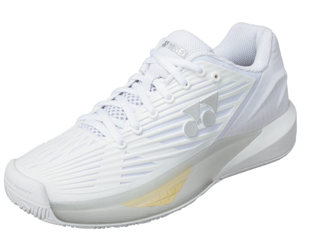 The Yonex Power Cushion Eclipsion 5 Women's Tennis Shoes in white are perfect for use as All Court Women's Tennis Shoes. These shoes feature textured details, the Yonex brand logo on the side, white laces, and a slightly elevated sole infused with Feather Bounce Foam, making them ideal for peak sports performance.