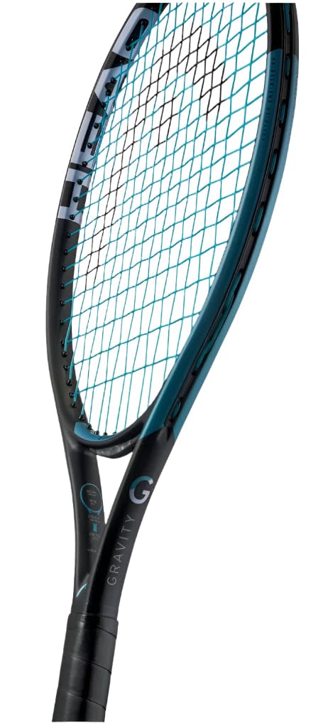 A close-up of the HEAD IG Gravity Junior 23 2025 Tennis Racket by HEAD, a kids’ racket in black and teal with "GRAVITY" on the frame, highlighting its lightweight graphite composite strings and part of the handle.