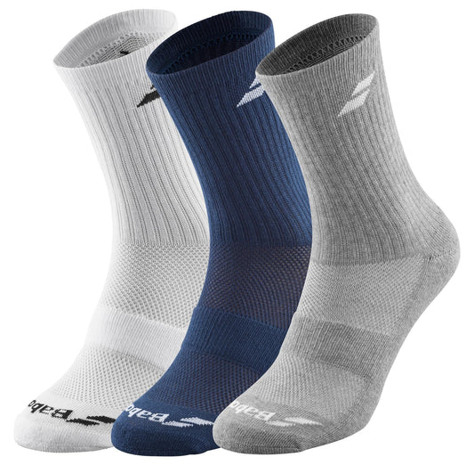 The Babolat Long 3 Pack Tennis Socks are presented in three colors: white, dark blue, and light gray. Each sock includes a ribbed texture at the calf and a logo placed near the ankle. These socks are crafted for optimal comfort and support, featuring ventilated zones to enhance breathability. They stand upright side by side for display.