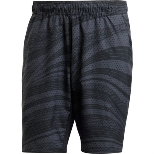 The ADIDAS Club Graphic Men's Tennis Shorts - Black by adidas have a sleek black design with a wavy, striped pattern and subtle polka dots. They include an elastic waistband and AEROREADY fabric for comfort on the court.