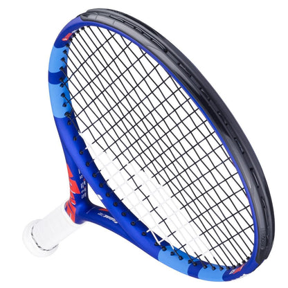 The Babolat Drive Junior 23 Tennis Racket, in blue and black with a white grip, is shown from the side to showcase its frame and strings—ideal for young players moving up from kids’ rackets.