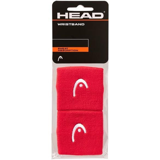 Set of HEAD 2.5" Tennis Wristbands in red, with white logo embroidery, emphasizing "sweat absorption" on the label. The package contains two wristbands.