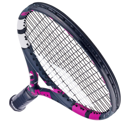 A close-up of the lightweight Babolat Boost Aero Pink 260g Tennis Racket by Babolat, featuring a black, white, and pink patterned frame with tightly strung strings, set against a white background.